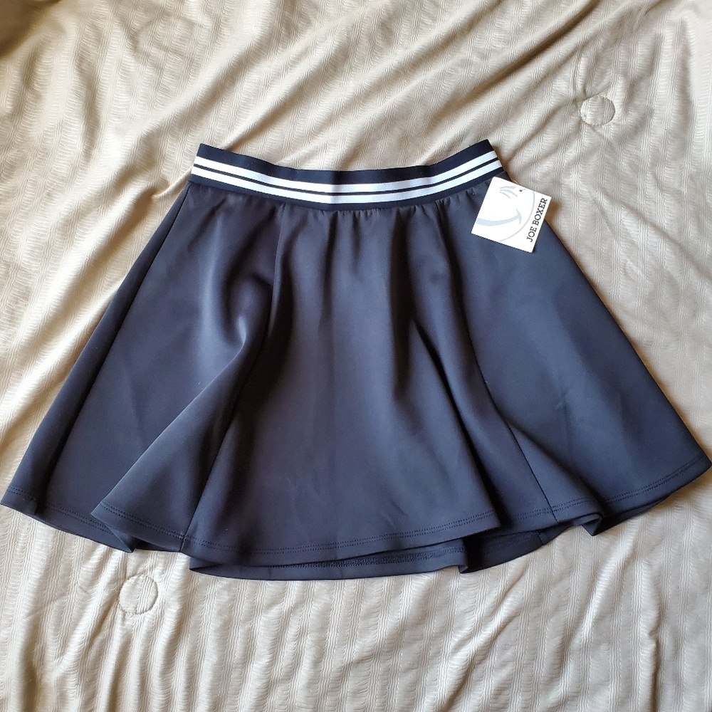 Black skirt with white stripes on top